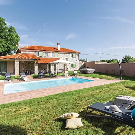 Holiday home Cozy In With Outdoor Swimming Pool Sajini