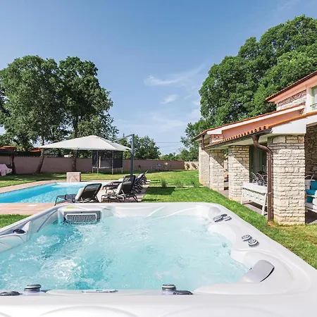 Holiday home Cozy In With Outdoor Swimming Pool Sajini
